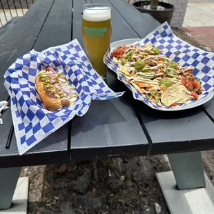 two plates of food on a picnic table