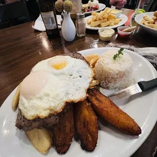 Yuca Huancaina,Lomo Saltado,chicken nuggets with fries,bistec a lo pobre