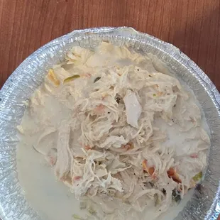 Chicken nachos with nachos on the side.