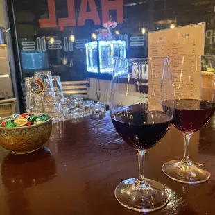 two glasses of wine on a table