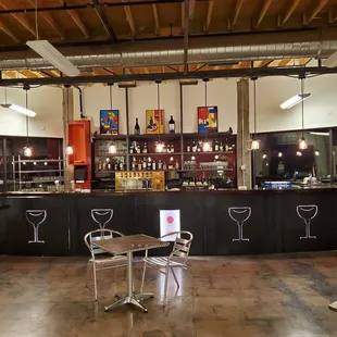 tables and chairs and a bar