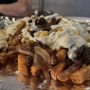 Bulgogi + corn cheese + fries, so yummy but you have to ask for it it's not on the menu to order like this. Super yummy tho! $20!