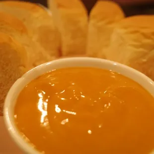 a bowl of soup and bread