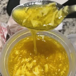 a spoon full of soup