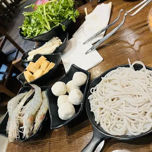 Enoki mushroom, fish ball, fish tofu, watercress, glass noodles