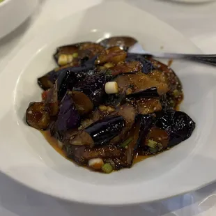 eggplant and vegetables on a white plate
