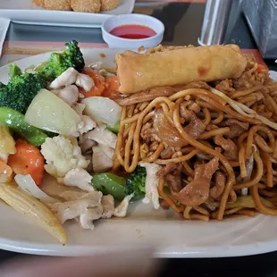 Veggies and chicken, egg roll, chow mein, and fried