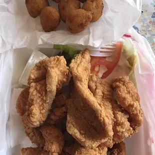 One order of hush puppies and a pound of catfish