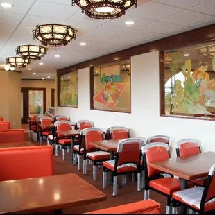 a row of tables and chairs