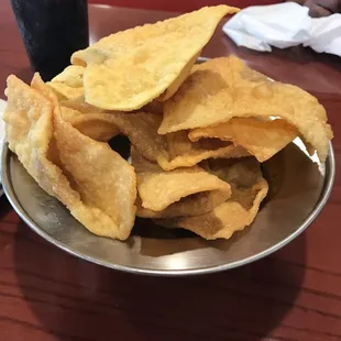 a plate of chips and a drink