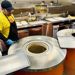 Cooking in the clay ovens
