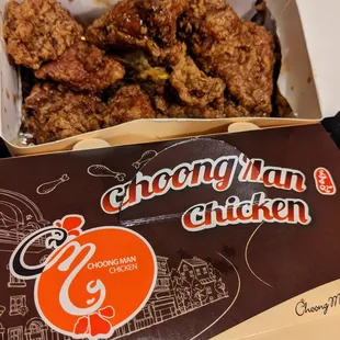 A couple boxes of Choong Man Chicken. Picture on top: #9. Garlic Soy Tikkudak (half chicken, $14.99).