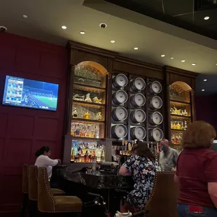people sitting at a bar