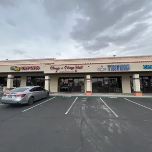 a car parked in front of a restaurant