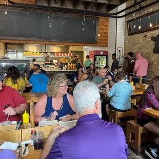 a large group of people eating