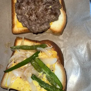 a burger and a side of asparagus