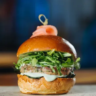 Ahi Tuna Burger-Sushi grade tuna, wasabi mayo, pickled ginger, nori chip, arugula