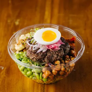 Farmers Bowl-Turmeric barley, roasted cauliflower, chili rubbed chick peas, edamame, grilled sweet potato, boiled egg