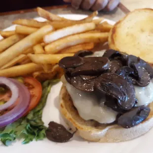Mushroom swiss burger and fries.