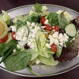 Salad along with lamb on the side (on another photo)