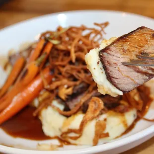 The Short Rib made for fork-tender, beefy bites. The short rib had a deep, meaty flavor and was served over fluffy whipped potatoes.