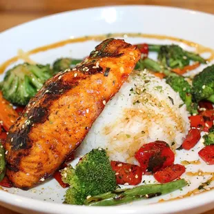 The Grilled Achiote Salmon Filet was made with Teriyaki Glaze, Sautéed Mixed Vegetables, Steamed Jasmine Rice, &amp; Furikake.