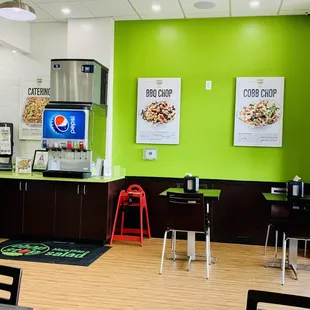 a bright green wall in a restaurant