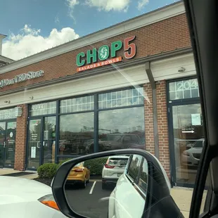 a view of the outside of a restaurant
