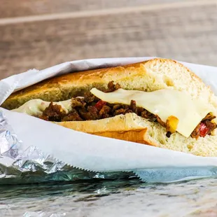 a sandwich wrapped in foil