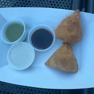 Samosa has spicy kick and the peanut chutney is very tasty!
