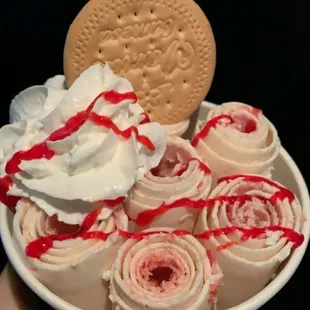 Strawberry cheesecake rolled ice cream.  Strawberry Wafer.