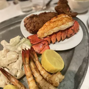 Seafood platter: pictured are the shrimp cocktail, lump crabmeat and twin lobster tails (one is broiled and the other deep fried).