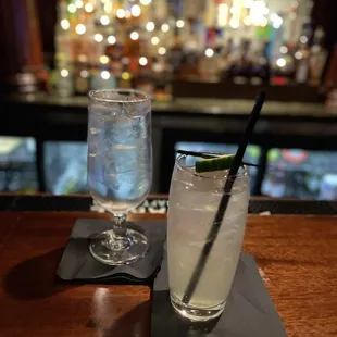 two cocktails on a bar