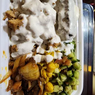 a meal in a styrofoam container