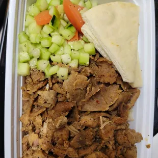 a meal in a styrofoam container