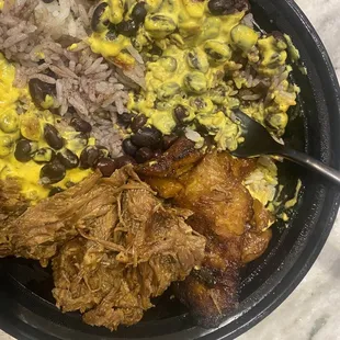Cuban bowl with beef and plantains, cream of curry topping sauce!