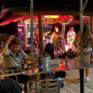 a group of people sitting at a table