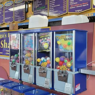 Gumball machines in front of the pick up.