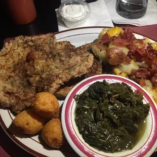 Pork chops, loaded redskin mashed potatoes, greens and hot water cornbread bites (genius)