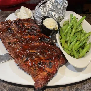 1/2 rack of ribs, baked potato, &amp; green beans.