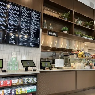 the counter and menus of the restaurant
