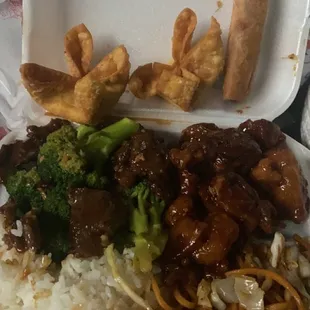 1/2 beef and broccoli and 1/2 orange chicken with noodles and white rice.