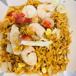 a plate of shrimp and rice