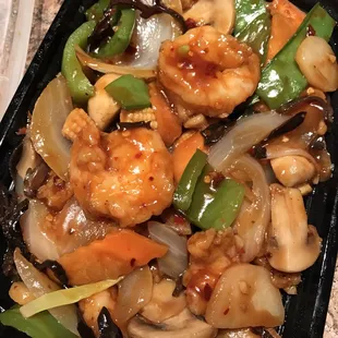 Garlic shrimp with green peppers, onions, mushrooms, and water chestnuts