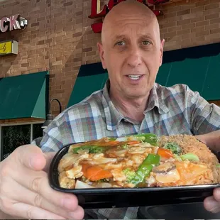 Me, eating the Chicken with Mixed Vegetables.