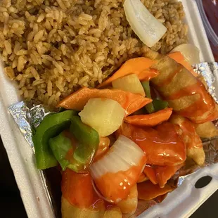 rice and vegetables in a styrofoam container
