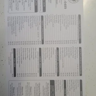 a close up of a menu on a table