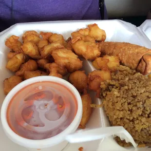 Sweet and sour chicken with rice and egg roll
