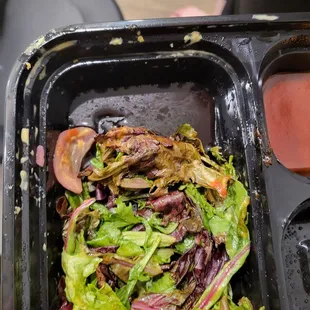 Soggy, wilted greens from firecracker shrimp bowl.