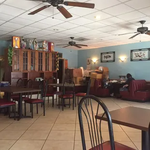 a dining room with a ceiling fan